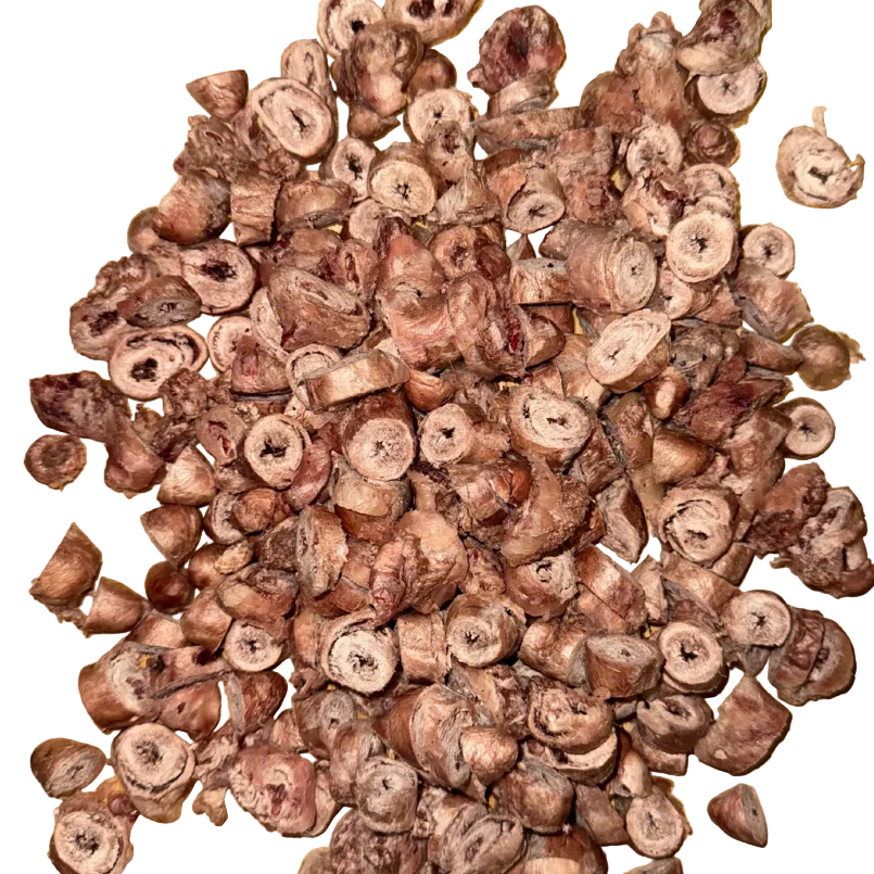 freeze-Dried chicken hearts on a wooden cutting board